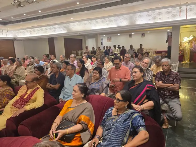 A full audience listening together